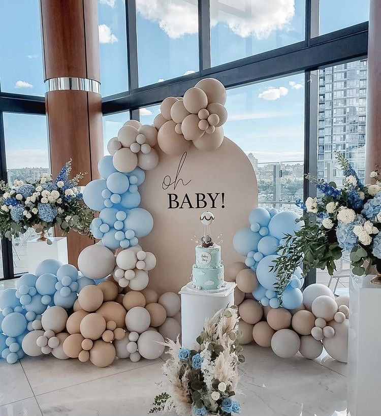Baby shower boy decorations in blue and gold with backdrops, balloons, and tableware – YOLO Events