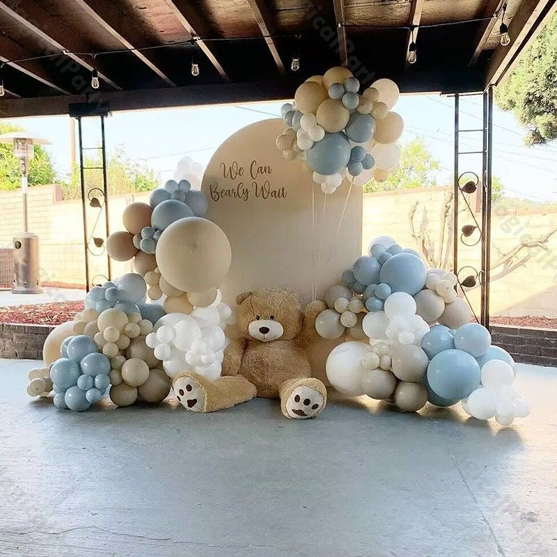 Baby shower boy decorations in blue and gold with backdrops, balloons, and tableware – YOLO Events